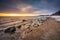 Amazing snowy beach in Gdynia Orlowo at sunrise, Baltic Sea. Poland