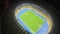 Amazing soccer stadium, glowing lights at night, aerial view, 4k