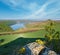 Amazing spring view on the Dnister River Canyon with picturesque rocks, fields, flowers. This place named Shyshkovi Gorby,