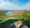 Amazing spring view on the Dnister River Canyon with picturesque rocks, fields, flowers. This place named Shyshkovi Gorby,