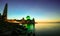 Amazing Straits Mosque of Malacca during sunrise with reflection