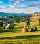 Amazing summer scene of Cluj County, Romania, Europe. Sunny morning view of Rogojel village. Beauty of countryside concept backgro