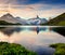 Amazing summer sunrise on Bachalpsee lake with Schreckhorn and W