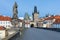 Amazing Sunny day on Charles bridge and historical center of Prague, buildings and landmarks of old town, Prague, Czech Republic