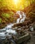 Amazing sunny summer landscape with beautiful Shypit waterfall in Carpathian mountains, popular tourist attraction, nature, travel