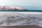 Amazing sunrise with amazing magenta color over sand beach. Tromso, Norway . Polar night. long shutter speed