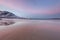 Amazing sunrise with amazing magenta color over sand beach. Tromso, Norway . Polar night. long shutter speed