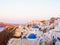 Amazing sunrise Santorini view with cave houses. Santorini island. Greece