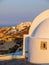 Amazing sunrise Santorini view with cave houses. Santorini island. Greece