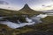 Amazing sunrise the top of Kirkjufellsfoss waterfall with Kirkju