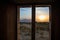 Amazing sunset in Gheralta seen through a window