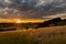 An amazing sunset over the Jeker valley in Maastricht with a dramatic sky