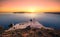 Amazing sunset at Panagia Theoskepasti, on the Skaros rock at Imerovigli, Santorini, Crete,