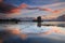 Amazing sunset with reflections at Castle Stalker