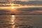 Amazing Sunset on the Sea. Adriatic sea with shore. Lignano Sabbiadoro, Italy.