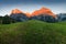 Amazing Swiss alpine mountain landscape, green fields and high mountains with snowy peaks in background, Grindelwald, Interlaken