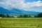 Amazing Tatra Mountains in Slovakia with blue sky background and grass field.