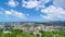 Amazing Timelapse Clouds flowing in blue Sky over Buildings Phuket City. Motion Time lapse White clouds swim and change