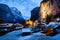 amazing touristic alpine village at night in winter with famous church and Staubbach waterfall  Lauterbrunnen  Switzerland  Europe