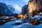 amazing touristic alpine village at night in winter with famous church and Staubbach waterfall  Lauterbrunnen  Switzerland  Europe