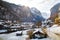 amazing touristic alpine village in winter with famous church and Staubbach waterfall  Lauterbrunnen  Switzerland  Europe