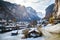 amazing touristic alpine village in winter with famous church and Staubbach waterfall  Lauterbrunnen  Switzerland  Europe