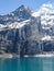 Amazing tourquise Oeschinnensee with Swiss Alps Kandersteg