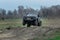 Amazing UTV driving in mud at Autumn day