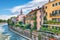 Amazing Verona cityscape view on the riverside with historical buildings and towers