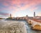Amazing Verona cityscape view on the riverside with historical buildings and towers