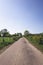 Amazing vertical shot of a beautiful countryside road