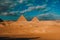 Amazing vide view of the great pyramids of giza in cairo, egypt. People on camels and horses riding around the amazing pyramids on