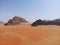 Amazing view from above on the huge, red, hot and very beautiful desert Wadi Rum. Kingdom of Jordan , Arab country in Western Asia