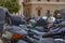 Amazing view of the city parking for scooters on Paseo Del Parque in Malaga. Close up photo on lots of parked assorted scooters.