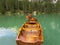 Amazing view of the famous Braies Lake in Italy. Typical rowing boats made of wood. Alpine lake. Iconic location for photographers