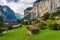 Amazing view of famous Lauterbrunnen town in Swiss Alps valley with Staubbach waterfalls in the background, Switzerland