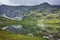 Amazing view with Fog over The Twin lake, The Seven Rila LakeÑ