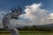 Amazing view with a great traditional thai naga dragon sculpture breathing huge white clouds as fire and smoke