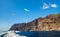 Amazing view of high cliffs from the boat. Location: Los Gigantes, Tenerife, Canary Islands. Artistic picture. Beauty world.