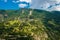 Amazing view of the hillside village and green slopes of the Swiss Alps. Colorful summer view of village. Idyllic