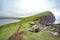 Amazing view of illusion lake on slave mountains of Tralanipan steep cliff in Vagar island, Faroe Islands, north Atlantic ocean,