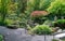 Amazing view on japanese garden in Wurzburg Bavaria with artificial stream and japanese maple and rocks