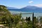 Amazing view of Lake Garda from the hills of the park Parco Pubblico Tomelleri in Sirmione town, Italy