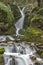 Amazing view of Leshnishki Waterfall in deep forest, Belasitsa Mountain