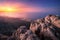 Amazing view from the mountain peak on rocks, city lights