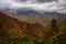 Amazing view of mountain range in fall foliage with dramatic clouds in the Great Smoky Mountains National Park