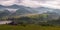 Amazing view of the mountain village Dzembronya foggy morning in the mountains in summer.