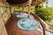 Amazing view of outdoor spa room with hydro massage working Jacuzz