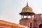 Amazing view of red sandstone octagonal tower with dome, Agra