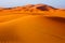 Amazing view of sand dunes in the Sahara Desert. Location: Sahara Desert, Merzouga, Morocco. Travel concept. Artistic picture.